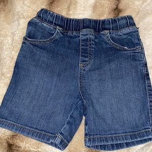 Blue boy jean shorts pull up